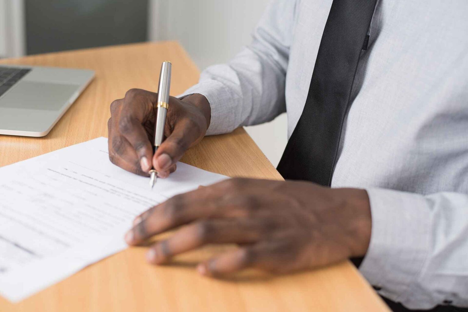 Person signing a document