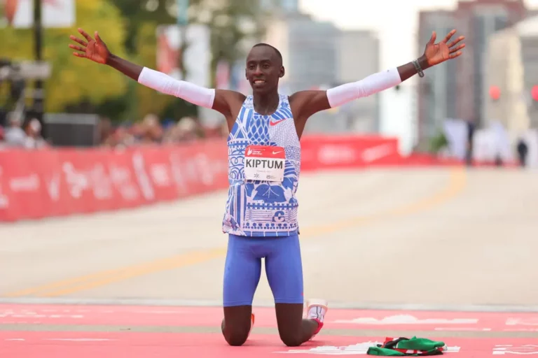 Kelvin Kiptum celebrates after setting a new world marathon record on October 8, 2023. Photo by Michael Reaves.| Getty Images