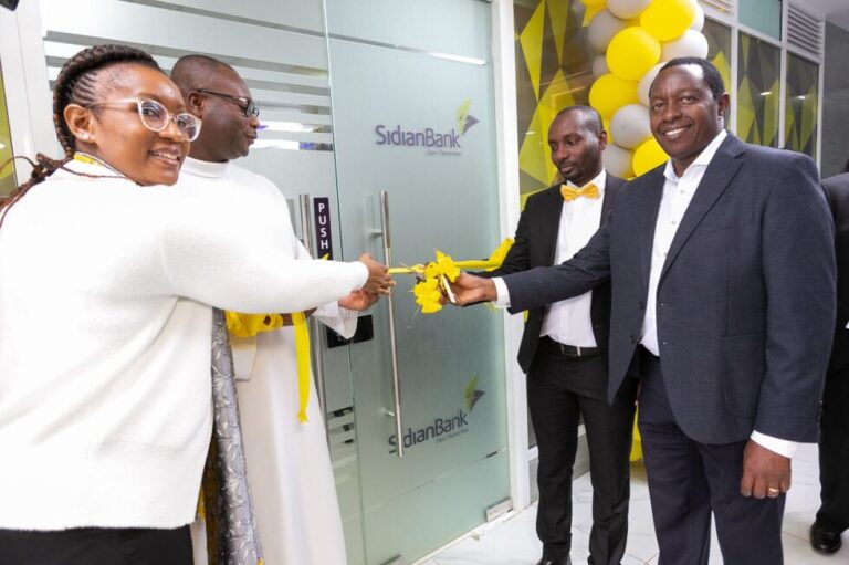 From left to right: Loise Mwangi, Head of Branches; Fr. Emmanuel Dogble of Our Lady of the Rosary Catholic Church, Ridgeways; Mr. Nelson Gitari, Branch Manager of Sidian Kiambu Branch; and Mr. Chege Thumbi, CEO of Sidian Bank, ceremoniously cut the ribbon to mark the unveiling of their 46th branch in Kiambu County.