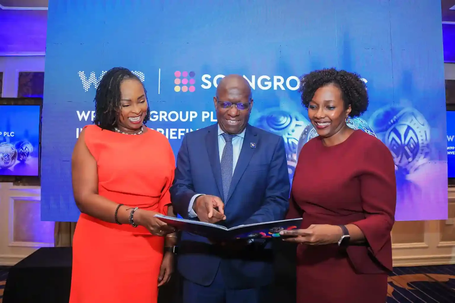 From left to right: WPP Scangroup PLC Chief Executive Officer Patricia Ithau, WPP Scangroup Board Chair Richard Omwela and WPP Scangroup Chief Financial Officer Miriam Kaggwa peruse through the 2023 Financial Results report during WPP Scangroup’s investor briefing event.