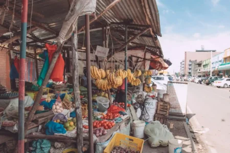 Fresh Fruits and Vegetables Displayed on a Stall. New CBK data shows 86% of respondents blame weather for rising food prices in Kenya. Coupled with a below-average rainfall forecast, food shortages are a growing concern.