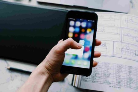 Person Holding Black Smartphone. Are we truly in control of our data?