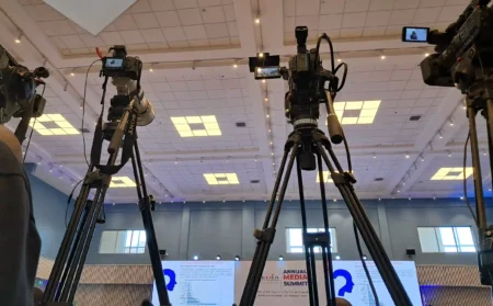 Journalists' cameras during the annual media summit 2025