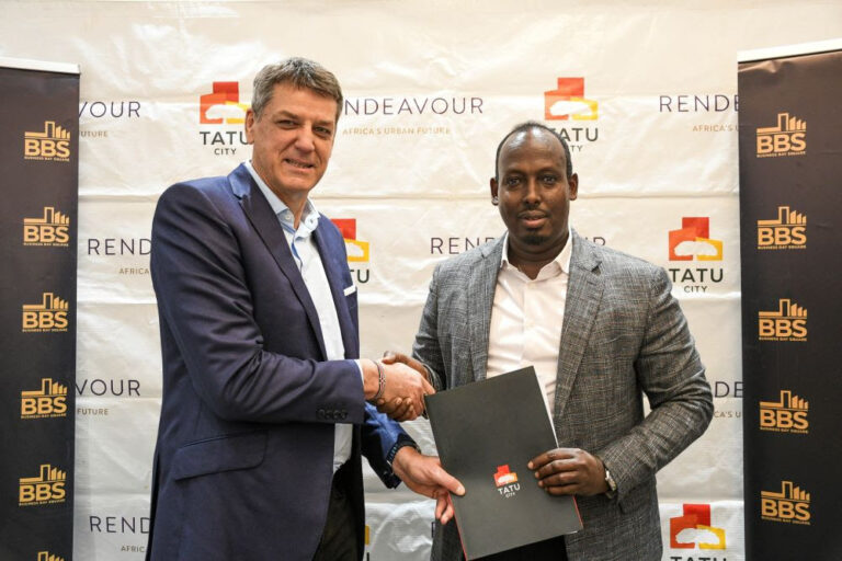 Business Bay Square Founder Abdiweli Hassan Secures KSh 65B Approval for Tatu City Mega Project Stephen Jennings and Abdiweli Hassan shake hands after signing KES 65B Tatu City development deal