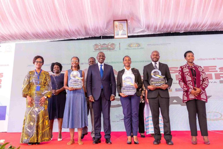 Award recipients pose during the EAC MSMEs Trade Fair, celebrating women champions and regional quality innovators.
