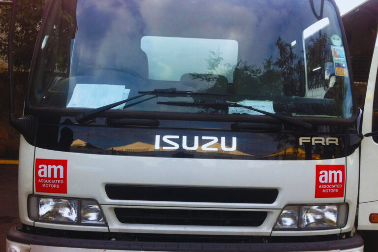 Official public notice from Isuzu East Africa Limited announcing the termination of its dealership agreement with Associated Motors Limited, March 2026.