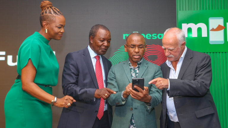 M-PESA logo displayed on a mobile phone screen in Nairobi, Kenya