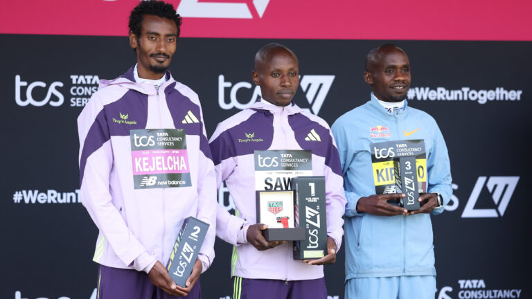 Sabastian Sawe, Yomif Kejelcha, and Jacob Kiplimo finish the 2026 London Marathon with the three fastest times in history, with Sawe winning in a world record of 1:59:30, Kejelcha second in 1:59:41 on debut, and Kiplimo third in 2:00:28, all under the previous world record of 2:00:35.