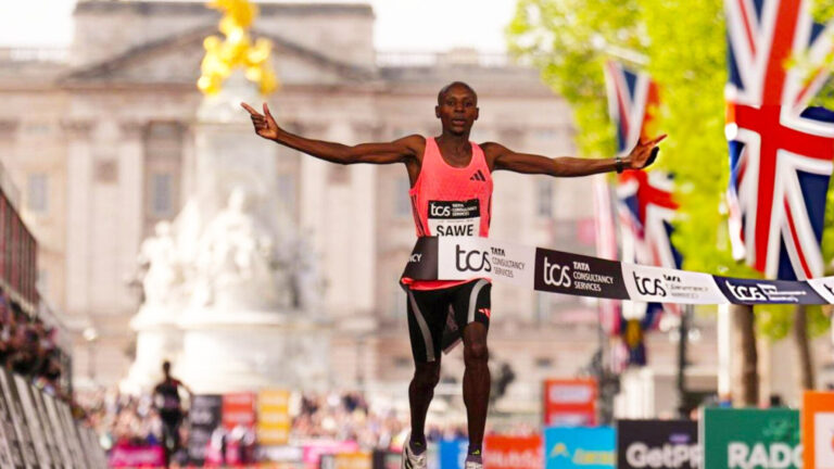 Sabastian Sawe of Kenya crosses the finish line at the 2026 London Marathon in a world record time of 1:59:30, becoming the first man to run a sub-two-hour marathon under official race conditions.