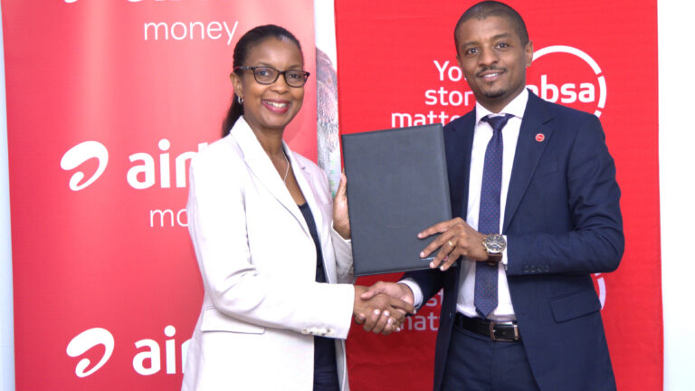 Airtel Money MD Anne Kinuthia-Otieno and Absa Bank Kenya Business Banking Director Renato D'Souza sign a partnership agreement enabling direct transfers from Airtel Money wallets into Absa Bank Kenya accounts and payments to merchant paybill numbers.