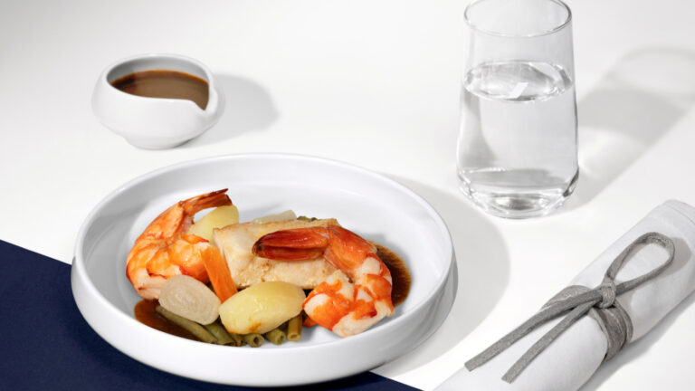 Sea bass and prawns in spicy bouillabaisse broth by Mory Sacko for Air France