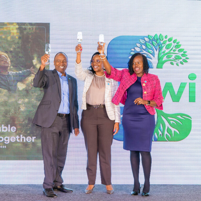 Tom Gitogo, Hilda Njeru, and Celestine Munda stand together at the launch of Britam's 2025 Sustainability Report at Britam Tower, Nairobi, on 4 June 2026.