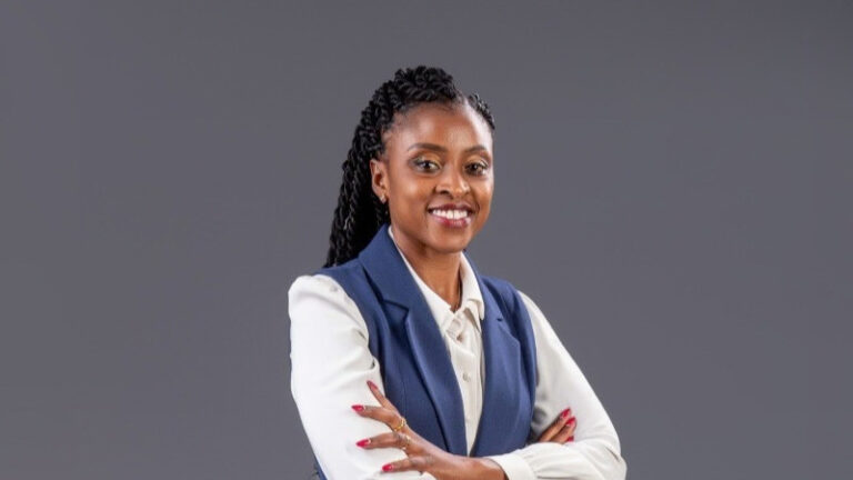 Carole Nderitu, Chief Operating Officer of Minet Kenya, in a navy blue blazer