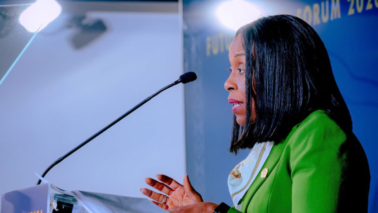 Afreximbank Backs EAC Customs Bond With $29 Million Guarantee Kanayo Awani, Executive Vice-President of Afreximbank, speaking at a podium at the Future Africa Forum 2026