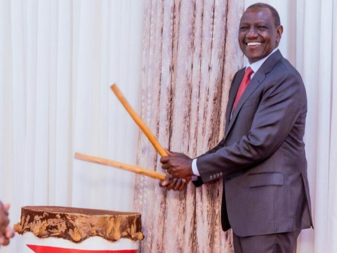 President William Ruto strikes a Burundian ceremonial drum in Nairobi
