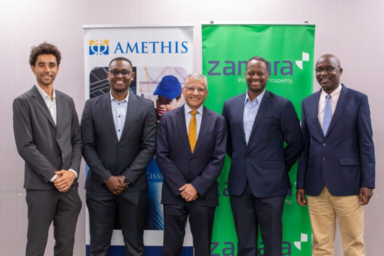 Executives from Zamara Holdings and Amethis stand together at a partnership signing event, with Amethis and Zamara branded banners behind them.