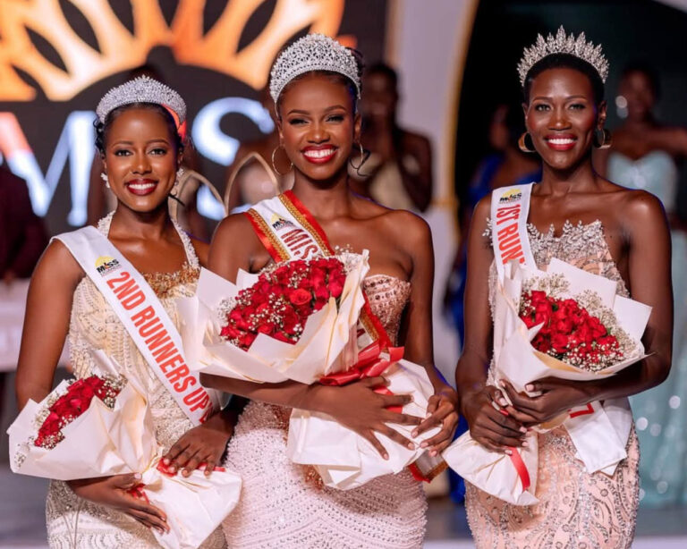 Almorie Nagayi Crowned Miss Uganda 2026/27 in Kampala Miss Uganda 2026/27 Almorie Nagayi with first runner up Bridget Prudence Nakato and second runner up Lukia Balunywa, holding red roses.